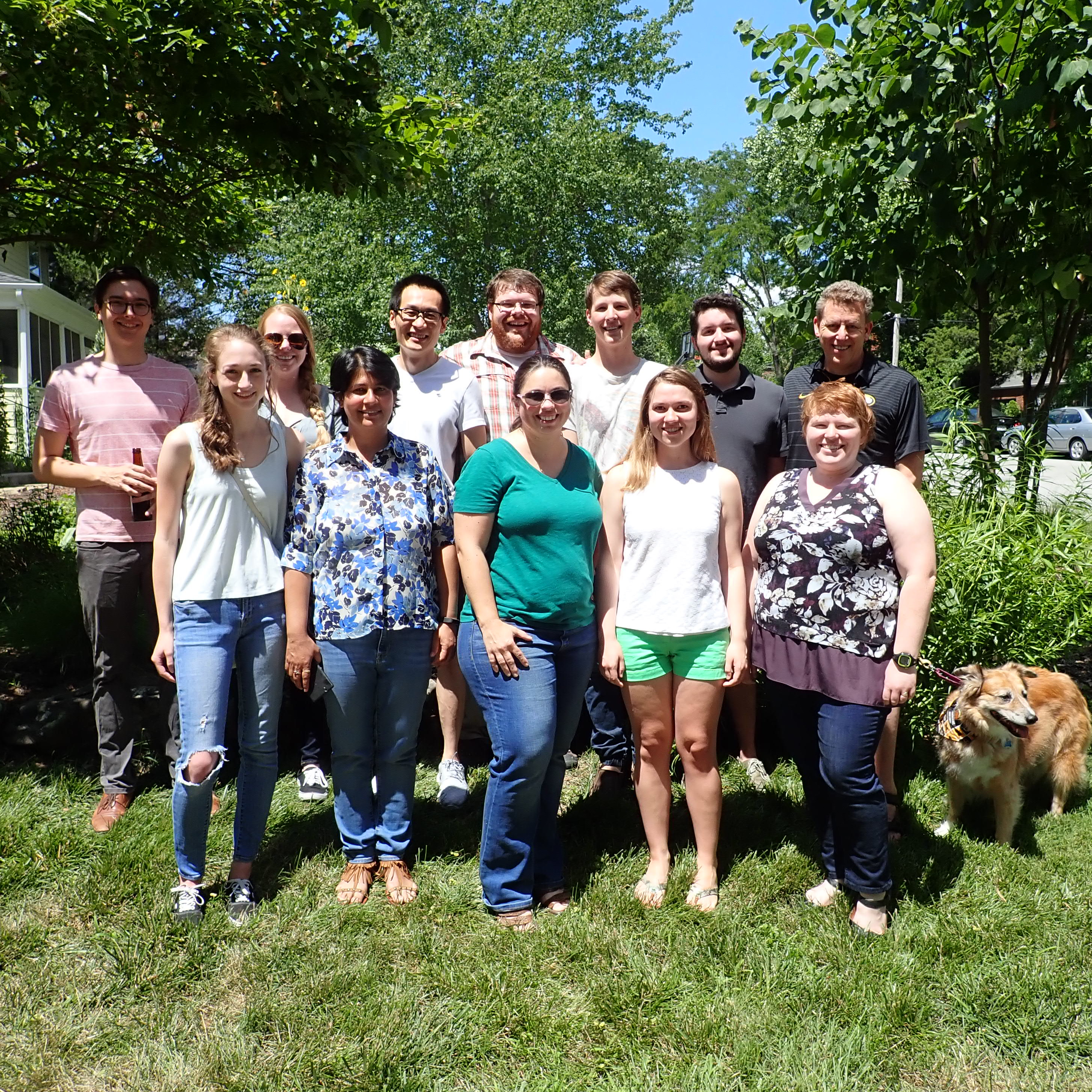 Group photo of the Pire's lab, including Chris's dog Trixie.
